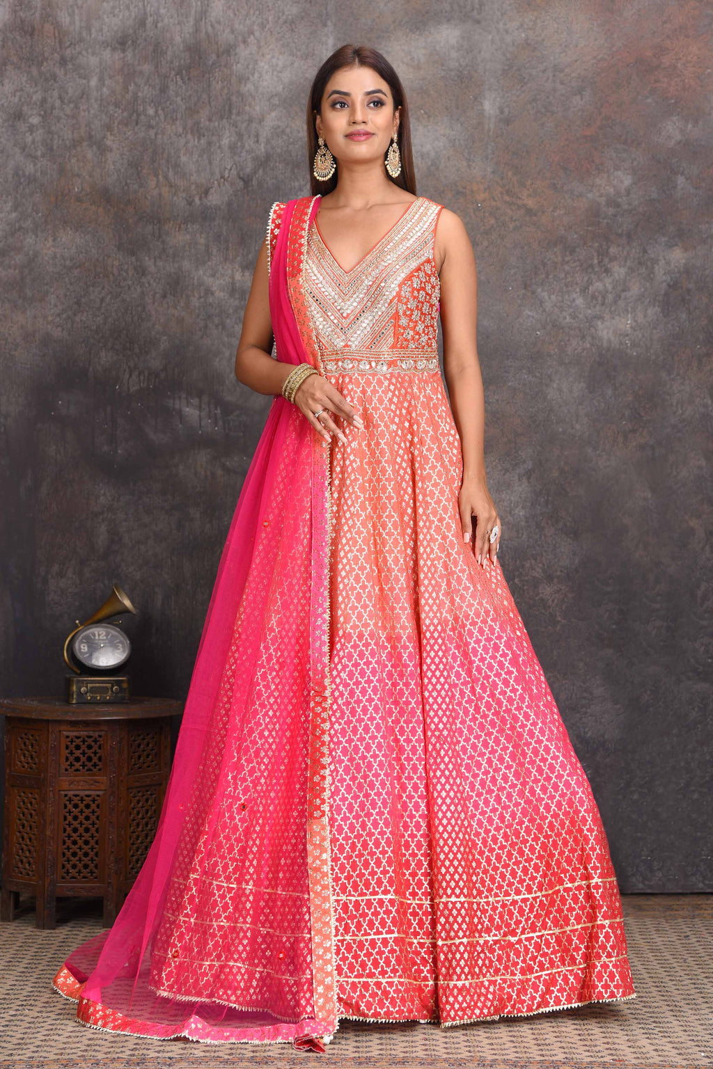 Shop beautiful peach and pink floorlength chanderi Banarasi Anarkali suit online in USA. Set a style statement on special occasions in exquisite designer lehengas, Anarkali suits, sharara suits, salwar suits, Indowestern outfits from Pure Elegance Indian fashion store in USA.-full view