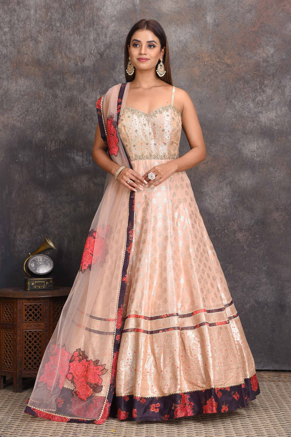 Buy beautiful cream chanderi Banarasi Anarkali online in USA with floral border. Set a style statement on special occasions in exquisite designer lehengas, Anarkali suits, sharara suits, salwar suits, Indowestern outfits from Pure Elegance Indian fashion store in USA.-full view