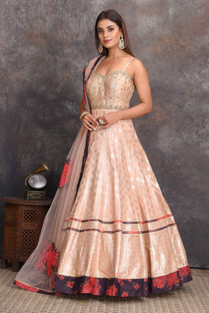 Buy beautiful cream chanderi Banarasi Anarkali online in USA with floral border. Set a style statement on special occasions in exquisite designer lehengas, Anarkali suits, sharara suits, salwar suits, Indowestern outfits from Pure Elegance Indian fashion store in USA.-side