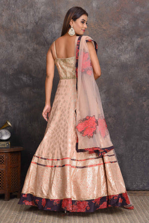 Buy beautiful cream chanderi Banarasi Anarkali online in USA with floral border. Set a style statement on special occasions in exquisite designer lehengas, Anarkali suits, sharara suits, salwar suits, Indowestern outfits from Pure Elegance Indian fashion store in USA.-back