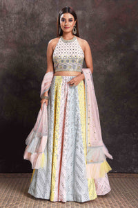 Buy beautiful multicolor pastel mirror work lehenga online in USA with ruffle dupatta. Look your ethnic best on festive occasions with latest designer sarees, pure silk sarees, Kanchipuram silk sarees, designer dresses, Anarkali suits, gown, embroidered sarees from Pure Elegance Indian fashion store in USA.-full view