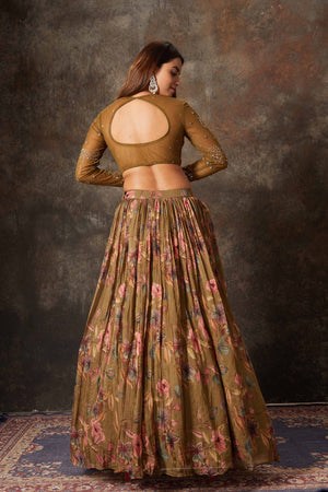 Buy brown printed and embroidered designer lehenga online in USA. Look stylish at parties and special occasions in beautiful designer sarees, embroidered sarees, handwoven silk, party sarees, lehengas, Anarkali suits from Pure Elegance Indian fashion store in USA.-back