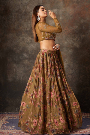 Buy brown printed and embroidered designer lehenga online in USA. Look stylish at parties and special occasions in beautiful designer sarees, embroidered sarees, handwoven silk, party sarees, lehengas, Anarkali suits from Pure Elegance Indian fashion store in USA.-side