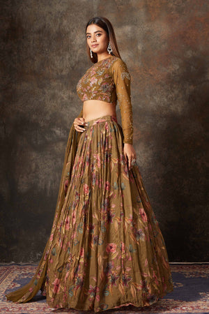 Buy brown printed and embroidered designer lehenga online in USA. Look stylish at parties and special occasions in beautiful designer sarees, embroidered sarees, handwoven silk, party sarees, lehengas, Anarkali suits from Pure Elegance Indian fashion store in USA.-left