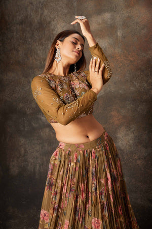 Buy brown printed and embroidered designer lehenga online in USA. Look stylish at parties and special occasions in beautiful designer sarees, embroidered sarees, handwoven silk, party sarees, lehengas, Anarkali suits from Pure Elegance Indian fashion store in USA.-closeup