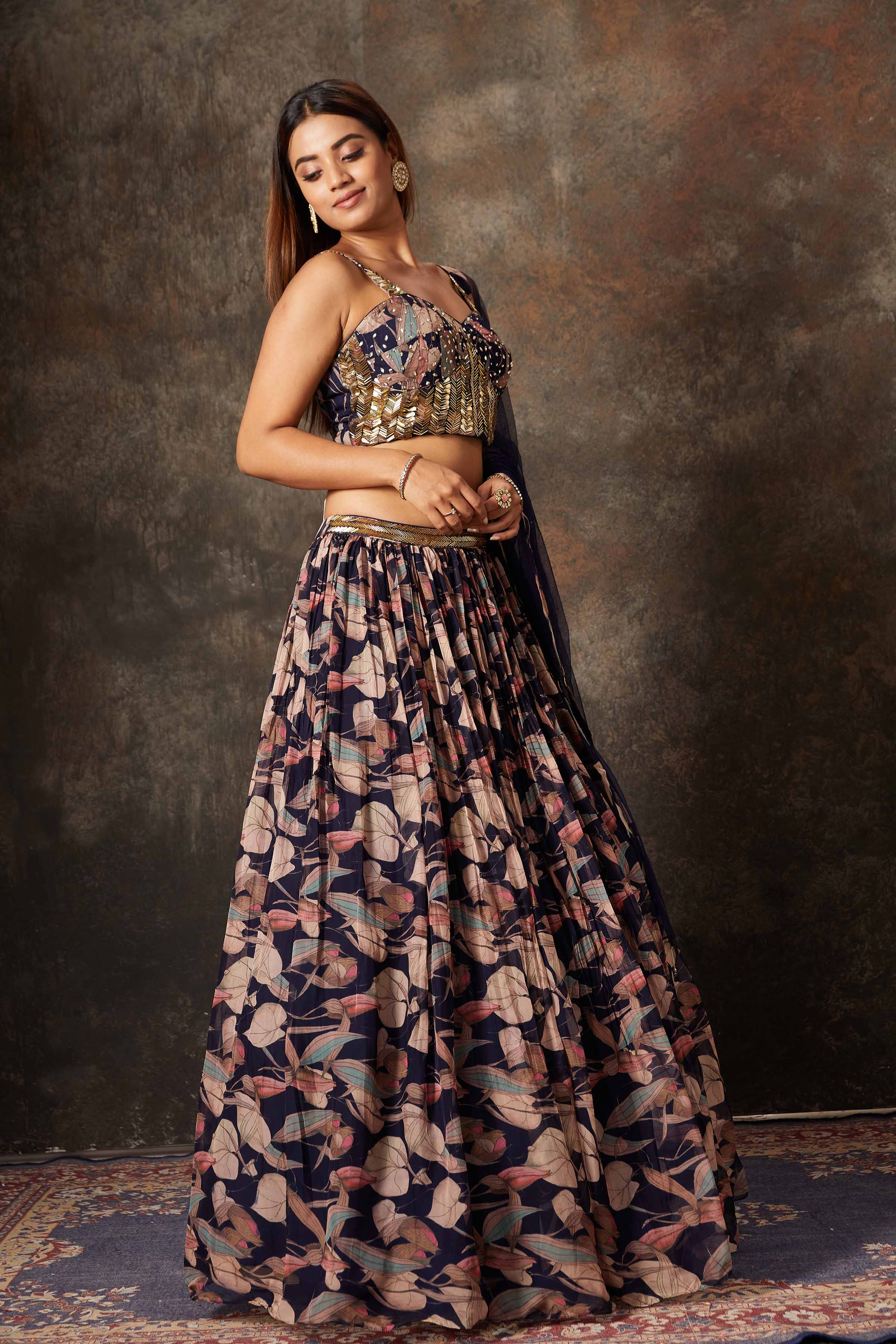 Buy beautiful blue printed and embroidered designer lehenga online in USA. Look stylish at parties and special occasions in beautiful designer sarees, embroidered sarees, handwoven silk, party sarees, lehengas, Anarkali suits from Pure Elegance Indian fashion store in USA.-side