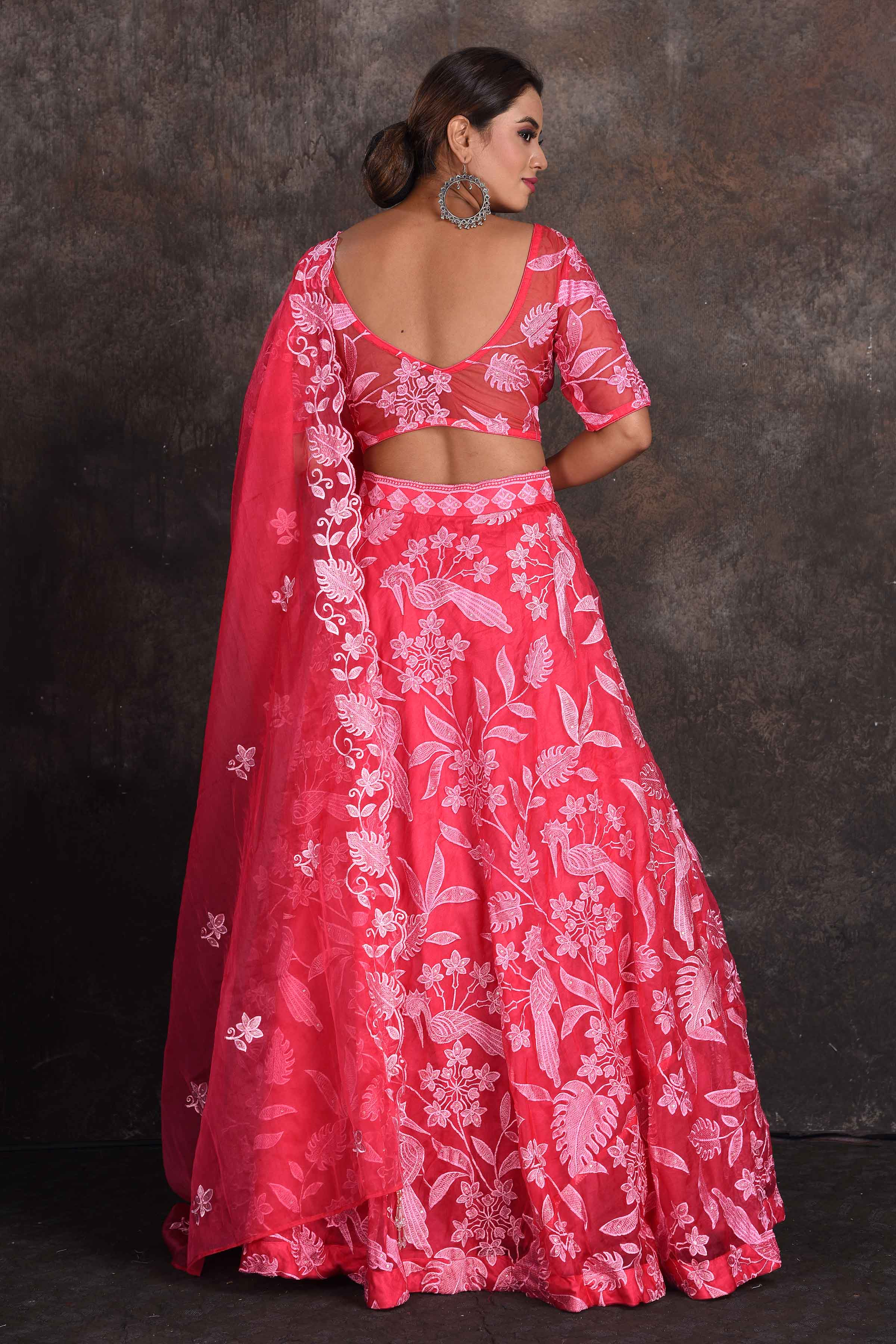 Shop pink floral embroidery designer lehenga online in USA with dupatta. Be the star of the occasion in this stylish designer lehengas, designer gowns, Indowestern dresses, Anarkali suits, sharara suits from Pure Elegance Indian fashion store in USA.-back