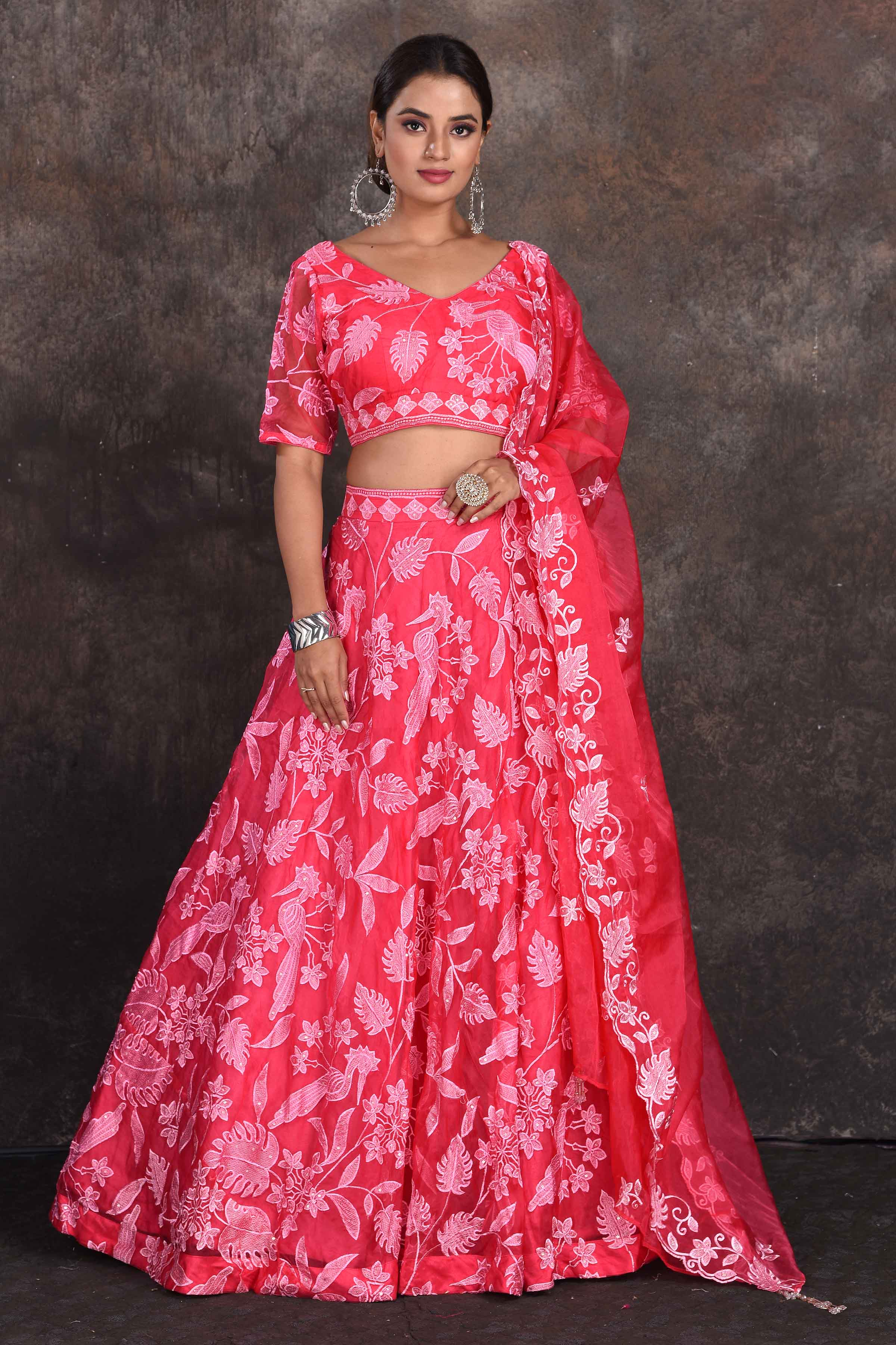 Shop pink floral embroidery designer lehenga online in USA with dupatta. Be the star of the occasion in this stylish designer lehengas, designer gowns, Indowestern dresses, Anarkali suits, sharara suits from Pure Elegance Indian fashion store in USA.-full view