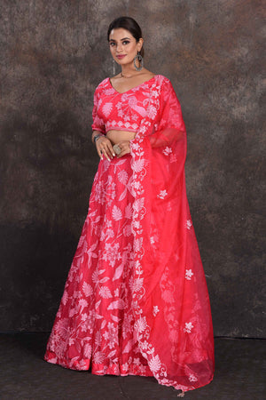 Shop pink floral embroidery designer lehenga online in USA with dupatta. Be the star of the occasion in this stylish designer lehengas, designer gowns, Indowestern dresses, Anarkali suits, sharara suits from Pure Elegance Indian fashion store in USA.-side