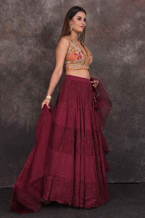 Buy wine color designer lehenga online in USA with multicolor blouse. Be the star of the occasion in this stylish designer lehengas, designer gowns, Indowestern dresses, Anarkali suits, sharara suits from Pure Elegance Indian fashion store in USA.-side