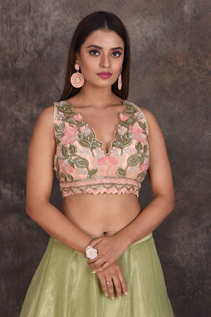 Shop beautiful pista green designer lehenga online in USA with pink blouse. Be the star of the occasion in this stylish designer lehengas, designer gowns, Indowestern dresses, Anarkali suits, sharara suits from Pure Elegance Indian fashion store in USA.-closeup