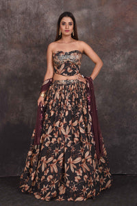 Buy stunning black floral designer lehenga online in USA with corset blouse. Be the star of the occasion in this stylish designer lehengas, designer gowns, Indowestern dresses, Anarkali suits, sharara suits from Pure Elegance Indian fashion store in USA.-full view