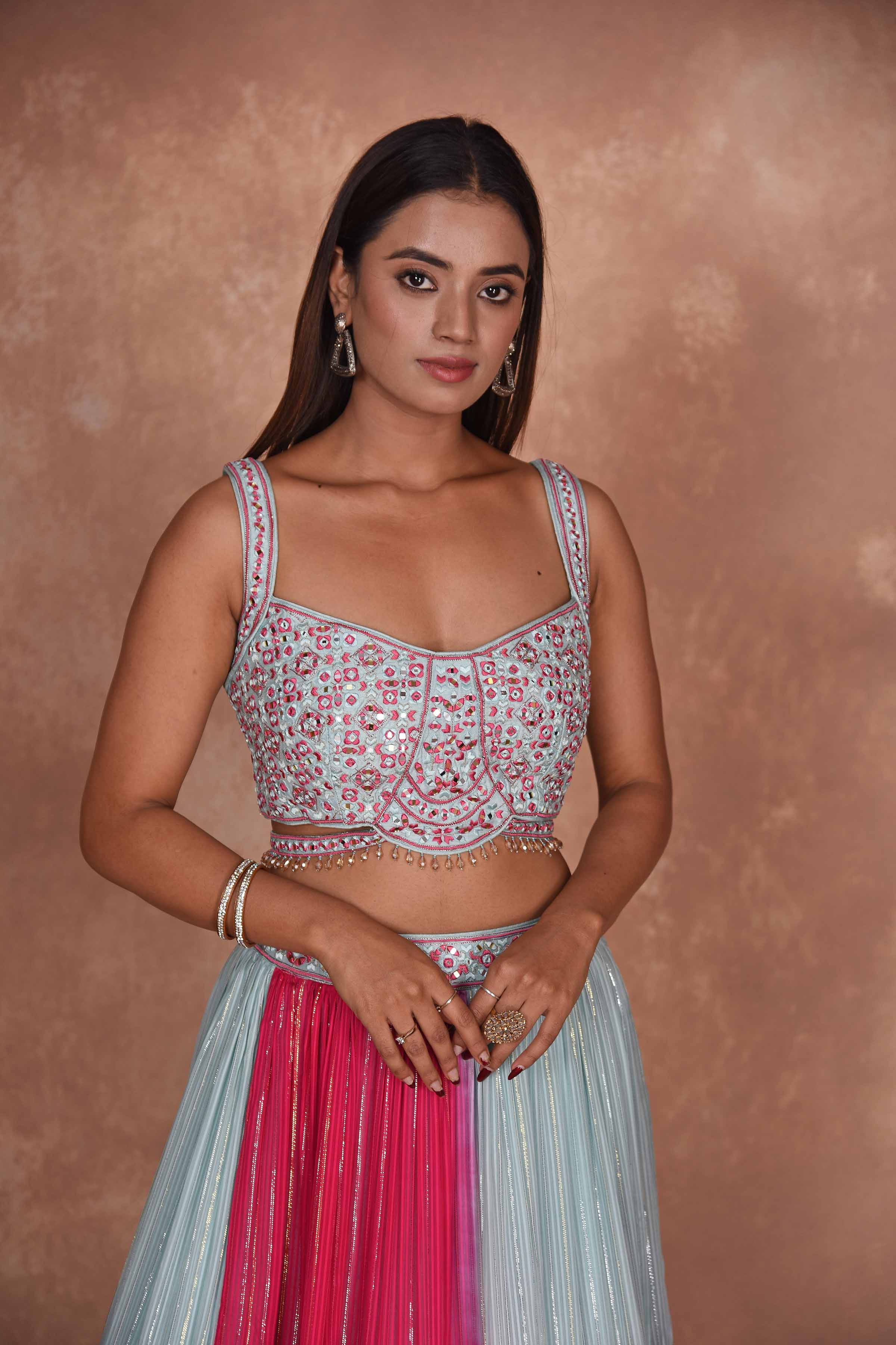 Buy beautiful powder blue and pink designer lehenga online in USA. Dazzle on weddings and special occasions with exquisite Indian designer dresses, embroidered sarees, partywear sarees, Bollywood sarees, handloom sarees, designer lehenga, Anarkali suits from Pure Elegance Indian clothing store in USA.-closeup