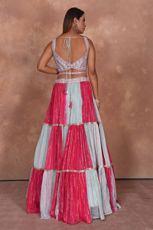 Buy beautiful powder blue and pink designer lehenga online in USA. Dazzle on weddings and special occasions with exquisite Indian designer dresses, embroidered sarees, partywear sarees, Bollywood sarees, handloom sarees, designer lehenga, Anarkali suits from Pure Elegance Indian clothing store in USA.-back