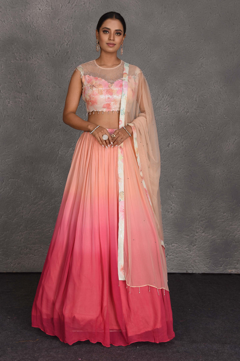 Buy beautiful ombre pink lehenga online in USA with sequin floral blouse. Flaunt your Indian style on festive occasions in stunning designer lehengas, Anarkali suit, sharara suits, designer gowns, designer sarees, embroidered sarees from Pure Elegance India fashion store in USA. -full view