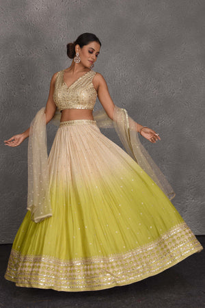 Buy cream and green sequin embroidery lehenga online in USA with dupatta. Flaunt your Indian style on festive occasions in stunning designer lehengas, Anarkali suit, sharara suits, designer gowns, designer sarees, embroidered sarees from Pure Elegance India fashion store in USA. -front