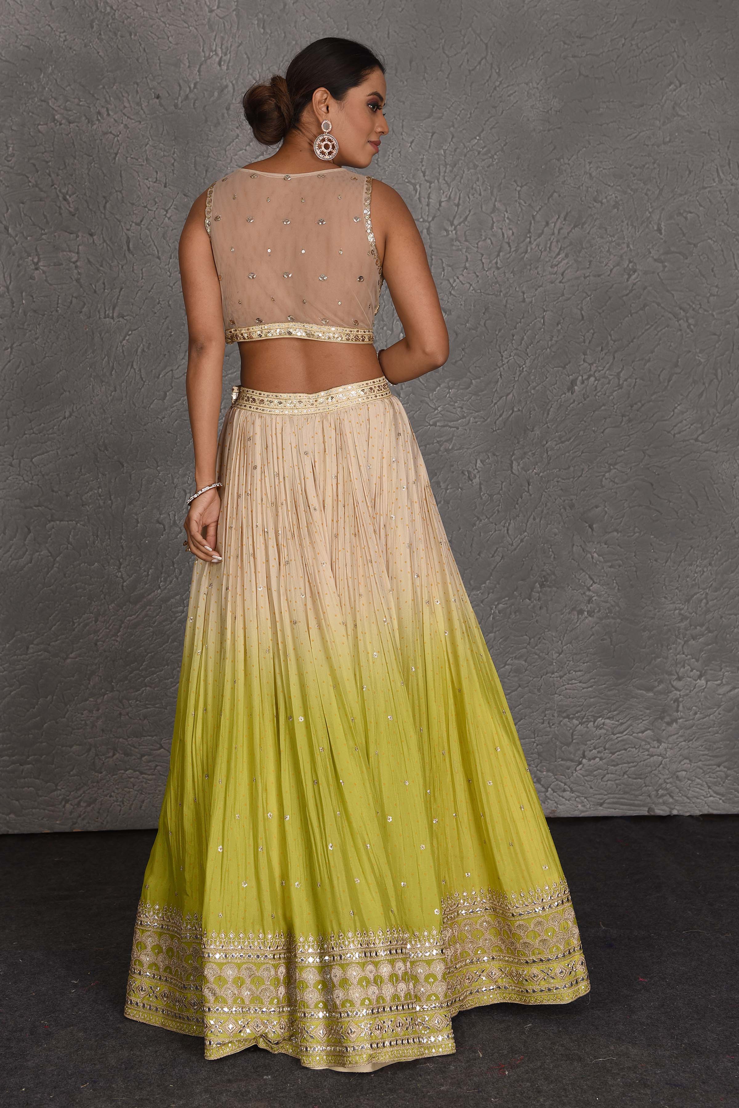 Buy cream and green sequin embroidery lehenga online in USA with dupatta. Flaunt your Indian style on festive occasions in stunning designer lehengas, Anarkali suit, sharara suits, designer gowns, designer sarees, embroidered sarees from Pure Elegance India fashion store in USA. -back