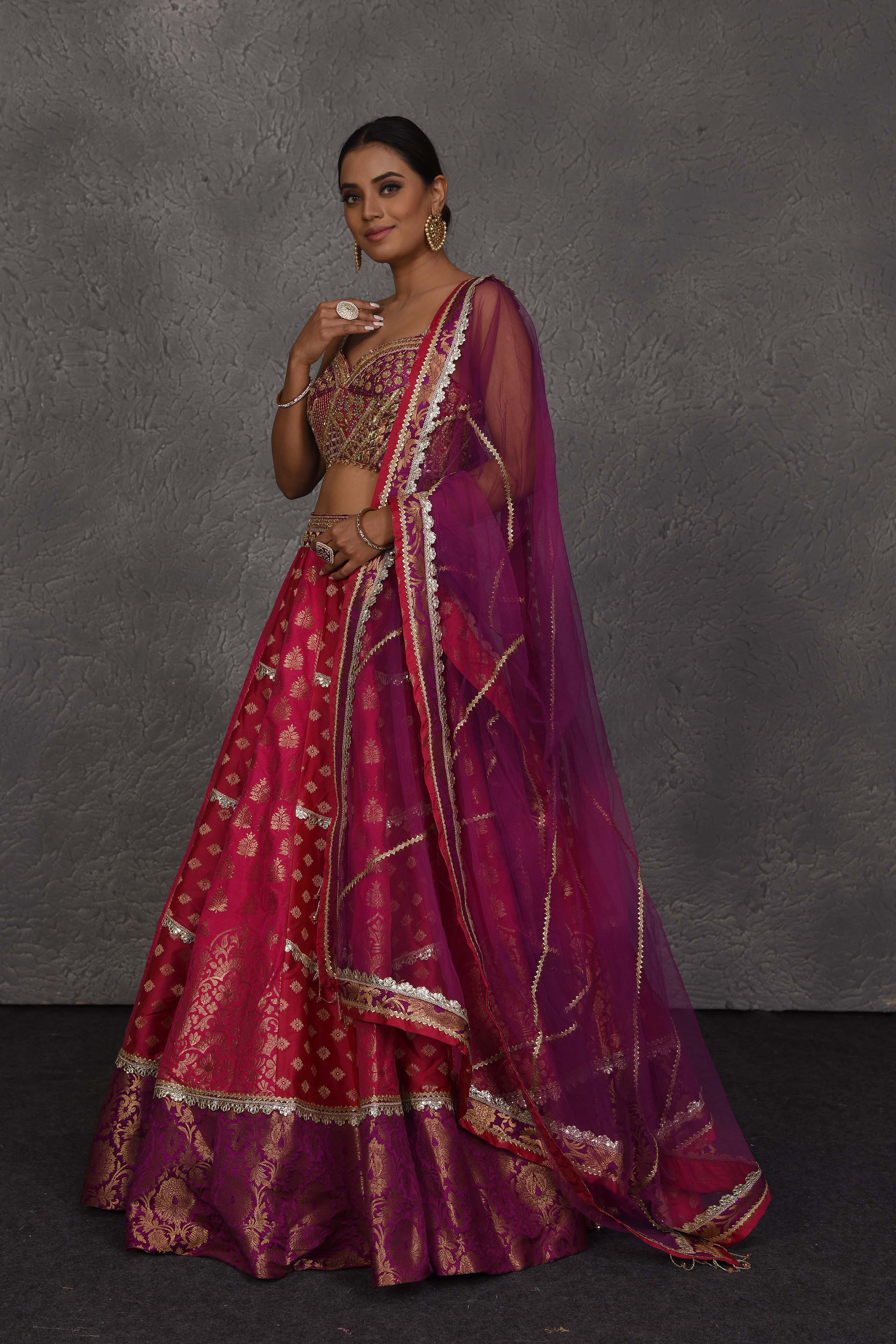 Buy pink and purple Banarasi embroidered lehenga online in USA with dupatta. Flaunt your Indian style on festive occasions in stunning designer lehengas, Anarkali suit, sharara suits, designer gowns, designer sarees, embroidered sarees from Pure Elegance India fashion store in USA. -dupatta