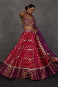 Buy pink and purple Banarasi embroidered lehenga online in USA with dupatta. Flaunt your Indian style on festive occasions in stunning designer lehengas, Anarkali suit, sharara suits, designer gowns, designer sarees, embroidered sarees from Pure Elegance India fashion store in USA. -full view