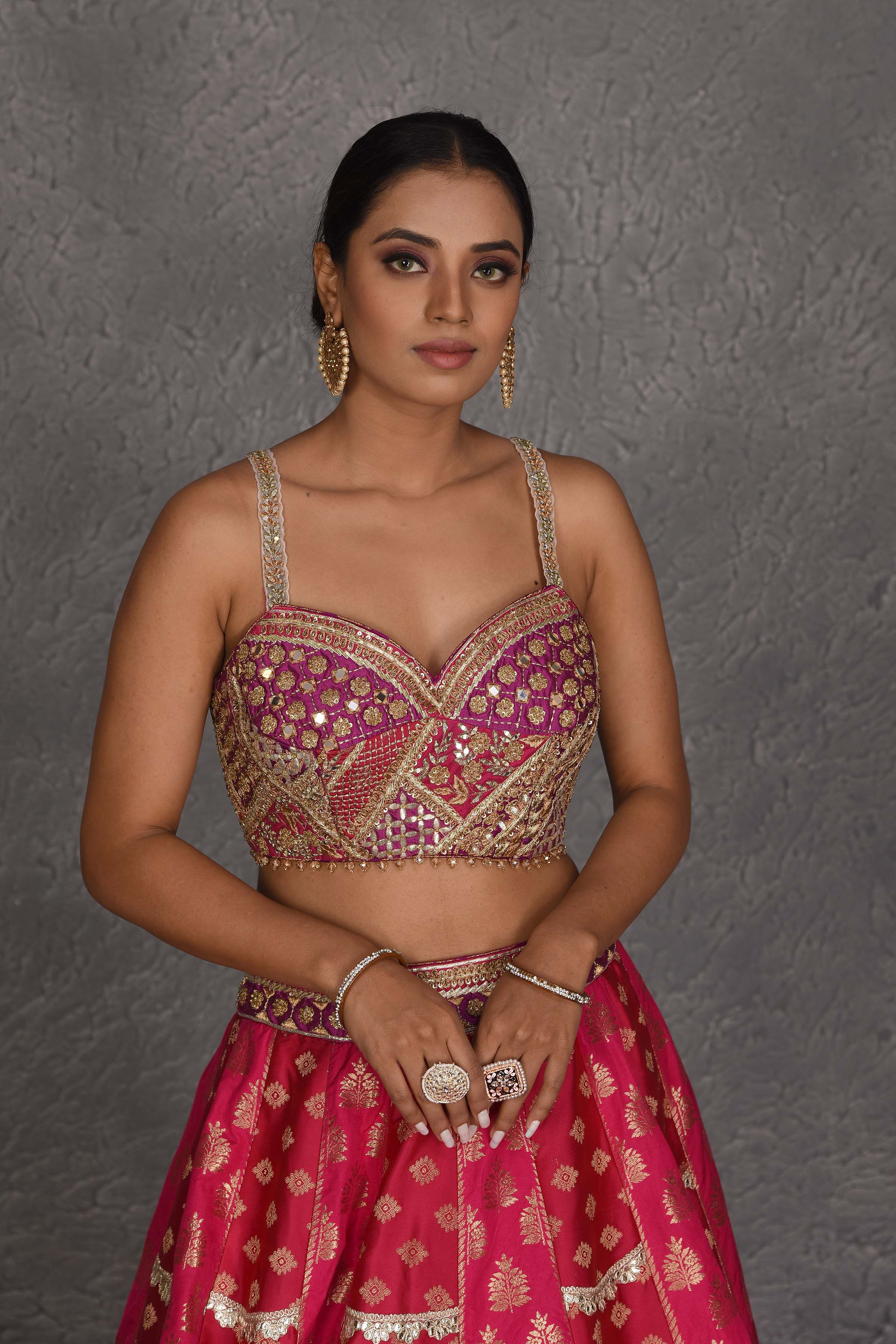 Buy pink and purple Banarasi embroidered lehenga online in USA with dupatta. Flaunt your Indian style on festive occasions in stunning designer lehengas, Anarkali suit, sharara suits, designer gowns, designer sarees, embroidered sarees from Pure Elegance India fashion store in USA. -closeup