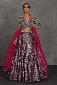 Shop purple hand embroidered Banarasi lehenga online in USA with pink dupatta. Flaunt your Indian style on festive occasions in stunning designer lehengas, Anarkali suit, sharara suits, designer gowns, designer sarees, embroidered sarees from Pure Elegance India fashion store in USA. -full view
