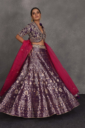 Shop purple hand embroidered Banarasi lehenga online in USA with pink dupatta. Flaunt your Indian style on festive occasions in stunning designer lehengas, Anarkali suit, sharara suits, designer gowns, designer sarees, embroidered sarees from Pure Elegance India fashion store in USA. -dupatta