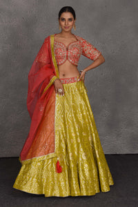 Buy yellow and red hand embroidered Banarasi lehenga online in USA with dupatta. Flaunt your Indian style on festive occasions in stunning designer lehengas, Anarkali suit, sharara suits, designer gowns, designer sarees, embroidered sarees from Pure Elegance India fashion store in USA. -full view