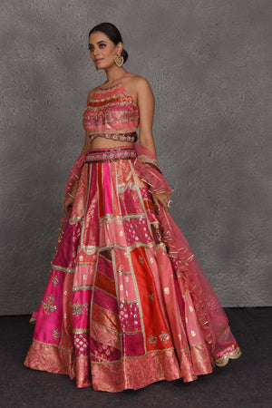 Shop pink patch work Banarasi embroidered lehenga online in USA with dupatta. Flaunt your Indian style on festive occasions in stunning designer lehengas, Anarkali suit, sharara suits, designer gowns, designer sarees, embroidered sarees from Pure Elegance India fashion store in USA. -side