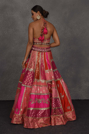 Shop pink patch work Banarasi embroidered lehenga online in USA with dupatta. Flaunt your Indian style on festive occasions in stunning designer lehengas, Anarkali suit, sharara suits, designer gowns, designer sarees, embroidered sarees from Pure Elegance India fashion store in USA. -back