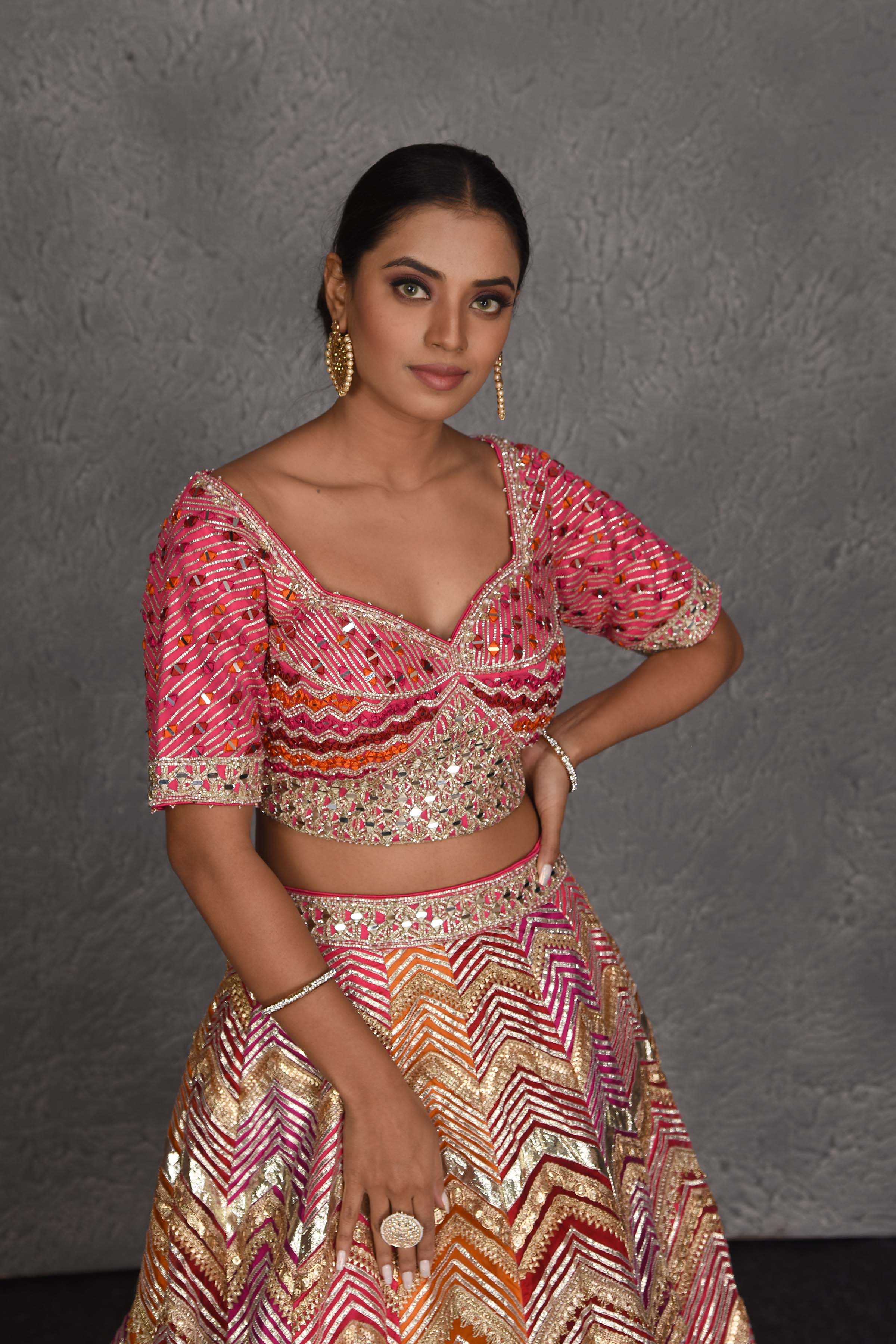 Buy stunning pink heavy gota lace work designer lehenga online in USA with dupatta. Flaunt your Indian style on festive occasions in stunning designer lehengas, Anarkali suit, sharara suits, designer gowns, designer sarees, embroidered sarees from Pure Elegance India fashion store in USA. -closeup