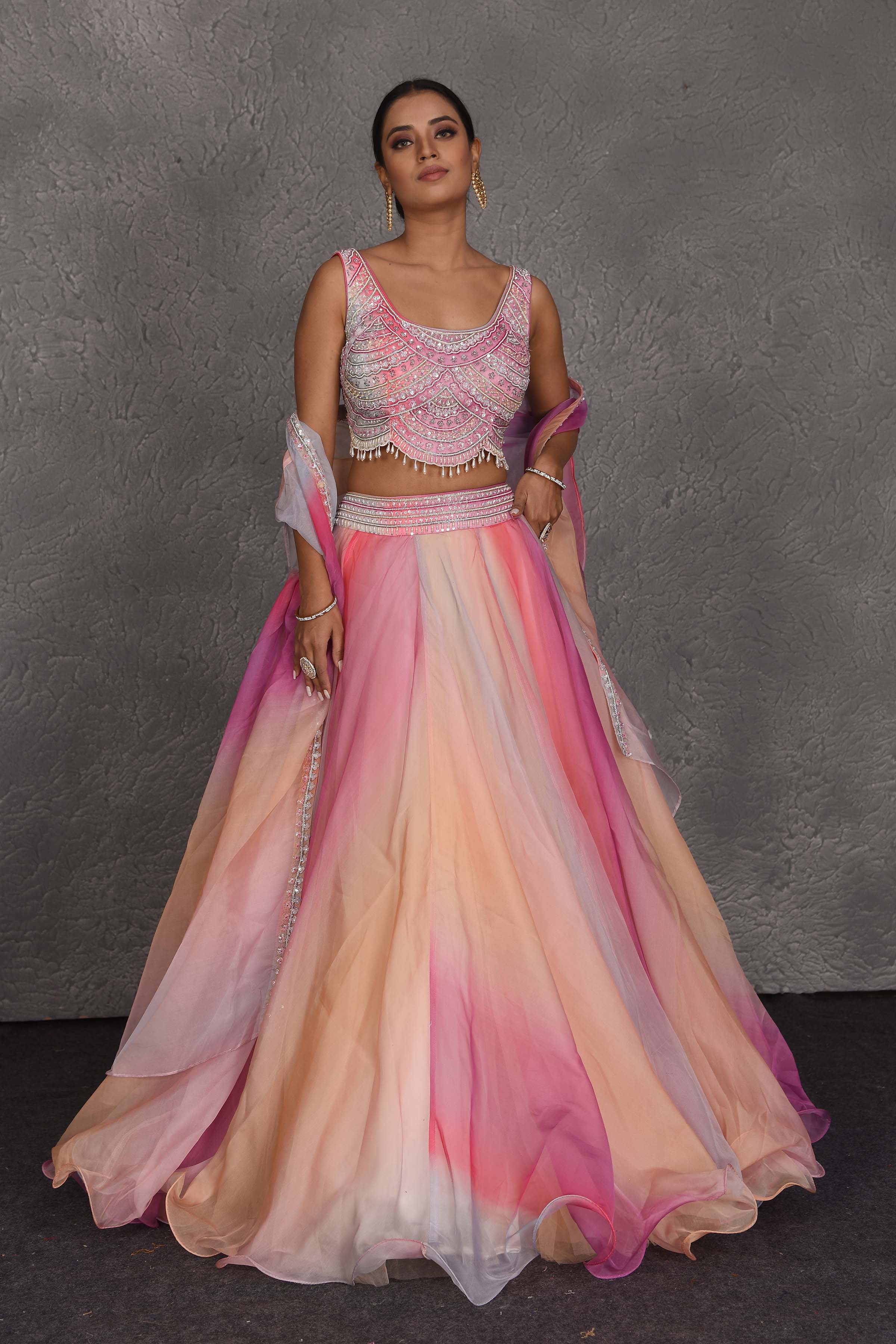 Buy stunning peach and pink embroidered designer lehenga online in USA with dupatta. Flaunt your Indian style on festive occasions in stunning designer lehengas, Anarkali suit, sharara suits, designer gowns, designer sarees, embroidered sarees from Pure Elegance India fashion store in USA. -full view