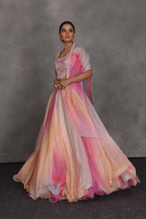 Buy stunning peach and pink embroidered designer lehenga online in USA with dupatta. Flaunt your Indian style on festive occasions in stunning designer lehengas, Anarkali suit, sharara suits, designer gowns, designer sarees, embroidered sarees from Pure Elegance India fashion store in USA. -left