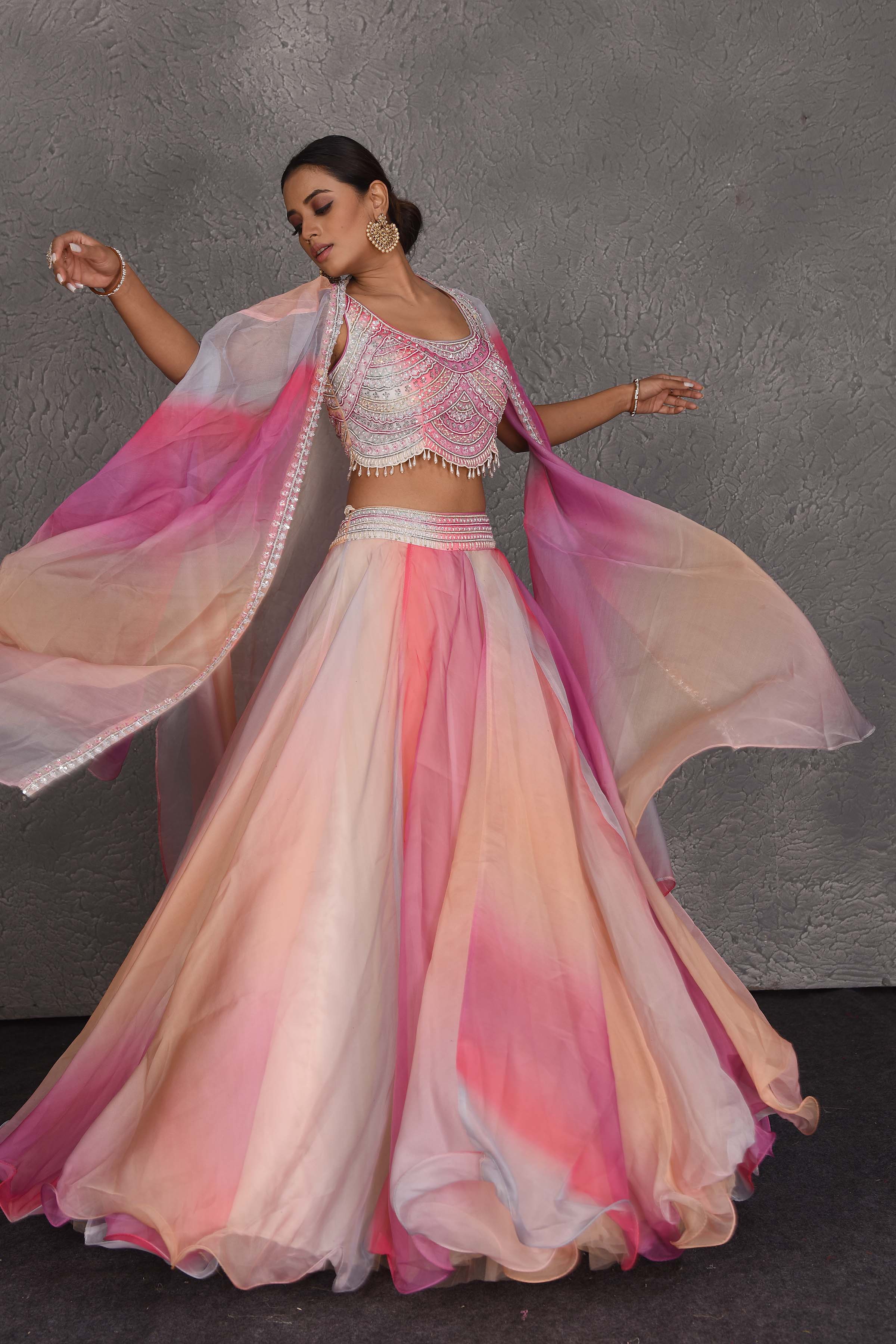 Buy stunning peach and pink embroidered designer lehenga online in USA with dupatta. Flaunt your Indian style on festive occasions in stunning designer lehengas, Anarkali suit, sharara suits, designer gowns, designer sarees, embroidered sarees from Pure Elegance India fashion store in USA. -lehenga
