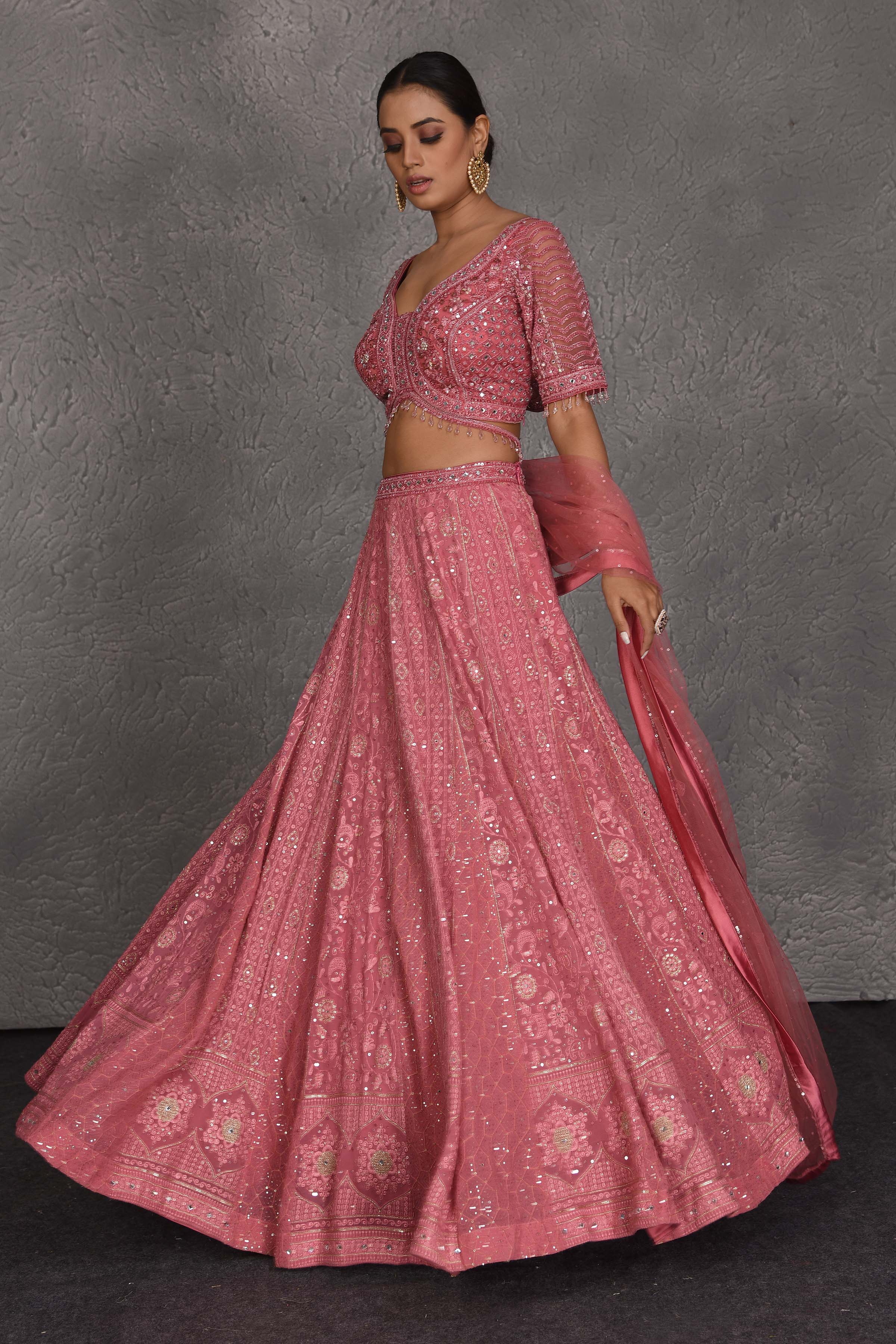 Shop blush pink embroidered designer lehenga online in USA with dupatta. Flaunt your Indian style on festive occasions in stunning designer lehengas, Anarkali suit, sharara suits, designer gowns, designer sarees, embroidered sarees from Pure Elegance India fashion store in USA. -lehenga