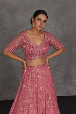 Shop blush pink embroidered designer lehenga online in USA with dupatta. Flaunt your Indian style on festive occasions in stunning designer lehengas, Anarkali suit, sharara suits, designer gowns, designer sarees, embroidered sarees from Pure Elegance India fashion store in USA. -closeup