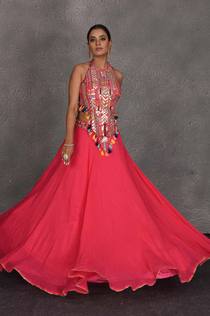 Shop pink boho lehenga online in USA with halter neck blouse. Flaunt your Indian style on festive occasions in stunning designer lehengas, Anarkali suit, sharara suits, designer gowns, designer sarees, embroidered sarees from Pure Elegance India fashion store in USA. -lehenga