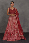 Shop red embroidered designer lehenga online in USA with net dupatta. Flaunt your Indian style on festive occasions in stunning designer lehengas, Anarkali suit, sharara suits, designer gowns, designer sarees, embroidered sarees from Pure Elegance India fashion store in USA. -full view