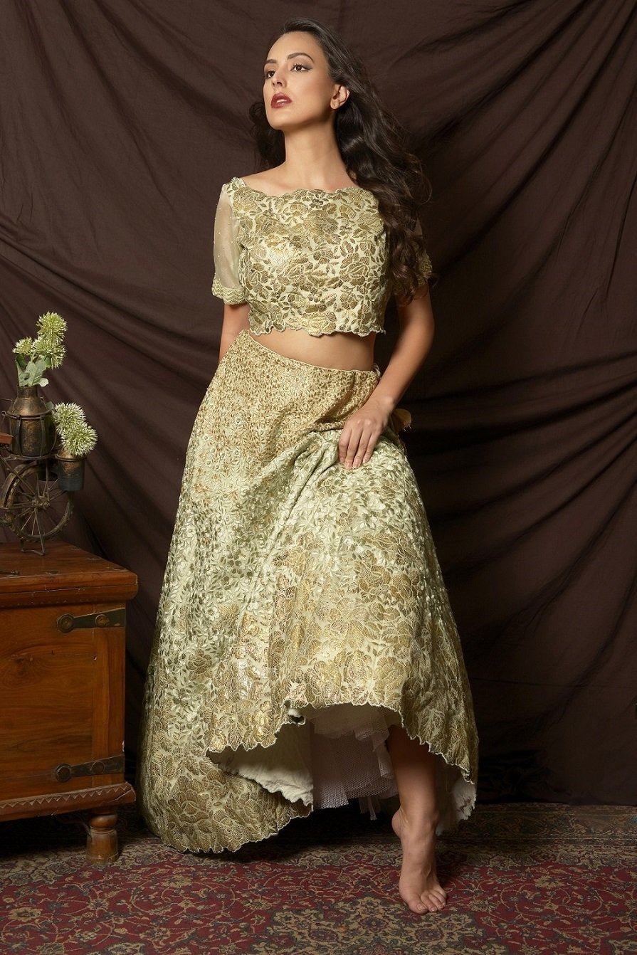 Buy gorgeous dusty green foil print embroidered lehenga online in USA with dupatta. Shine at weddings and special occasions with beautiful Indian designer dresses, gowns, lehengas from Pure Elegance Indian clothing store in USA.-without dupatta