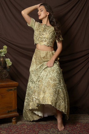Buy gorgeous dusty green foil print embroidered lehenga online in USA with dupatta. Shine at weddings and special occasions with beautiful Indian designer dresses, gowns, lehengas from Pure Elegance Indian clothing store in USA.-lehenga