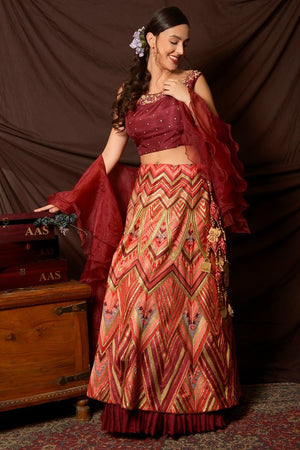 Shop beautiful maroon and multicolor embroidered organza lehenga online in USA with dupatta. Shine at weddings and special occasions with beautiful Indian designer dresses, gowns, lehengas from Pure Elegance Indian clothing store in USA.-side view