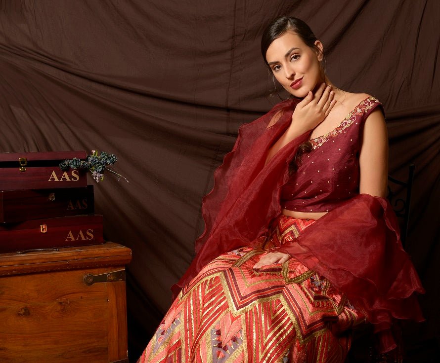 Shop beautiful maroon and multicolor embroidered organza lehenga online in USA with dupatta. Shine at weddings and special occasions with beautiful Indian designer dresses, gowns, lehengas from Pure Elegance Indian clothing store in USA.-closeup