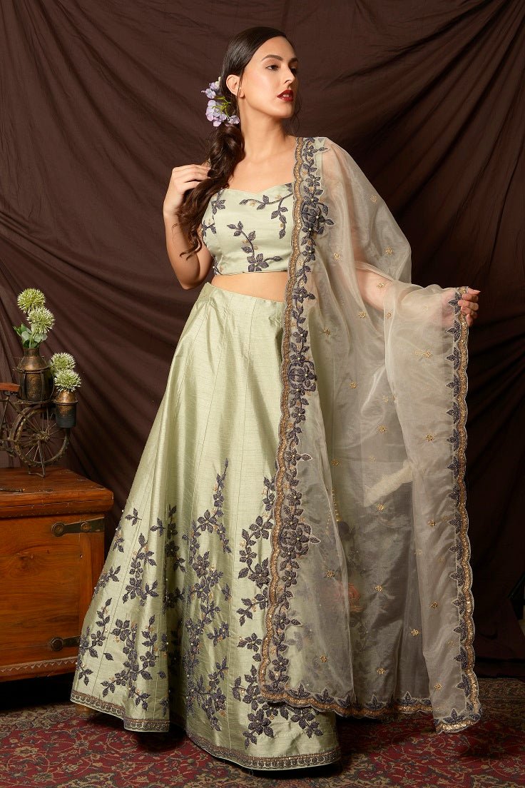 Buy stunning mint green embroidered silk lehenga online in USA with dupatta. Shine at weddings and special occasions with beautiful Indian designer dresses, gowns, lehengas from Pure Elegance Indian clothing store in USA.-lehenga