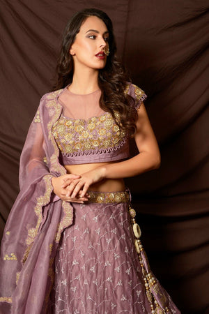 Buy attractive mauve color embroidered organza lehenga online in USA with dupatta. Shine at weddings and special occasions with beautiful Indian designer dresses, gowns, lehengas from Pure Elegance Indian clothing store in USA.-closeup