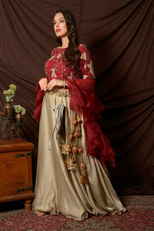 Buy gorgeous maroon and grey embroidered shimmer and chiffon lehenga online in USA. Shine at weddings and special occasions with beautiful Indian designer dresses, gowns, lehengas from Pure Elegance Indian clothing store in USA.-left side
