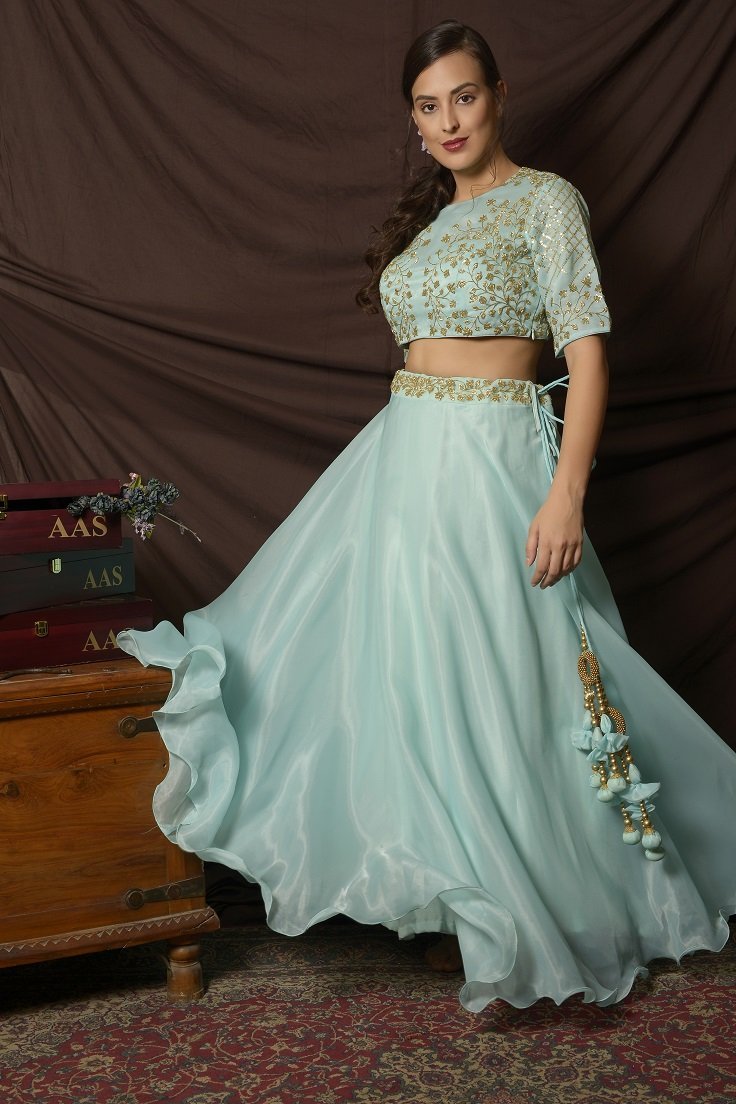Buy beautiful light blue embroidered organza lehenga online in USA with sequin dupatta. Shine at weddings and special occasions with beautiful Indian designer dresses, gowns, lehengas from Pure Elegance Indian clothing store in USA.-side