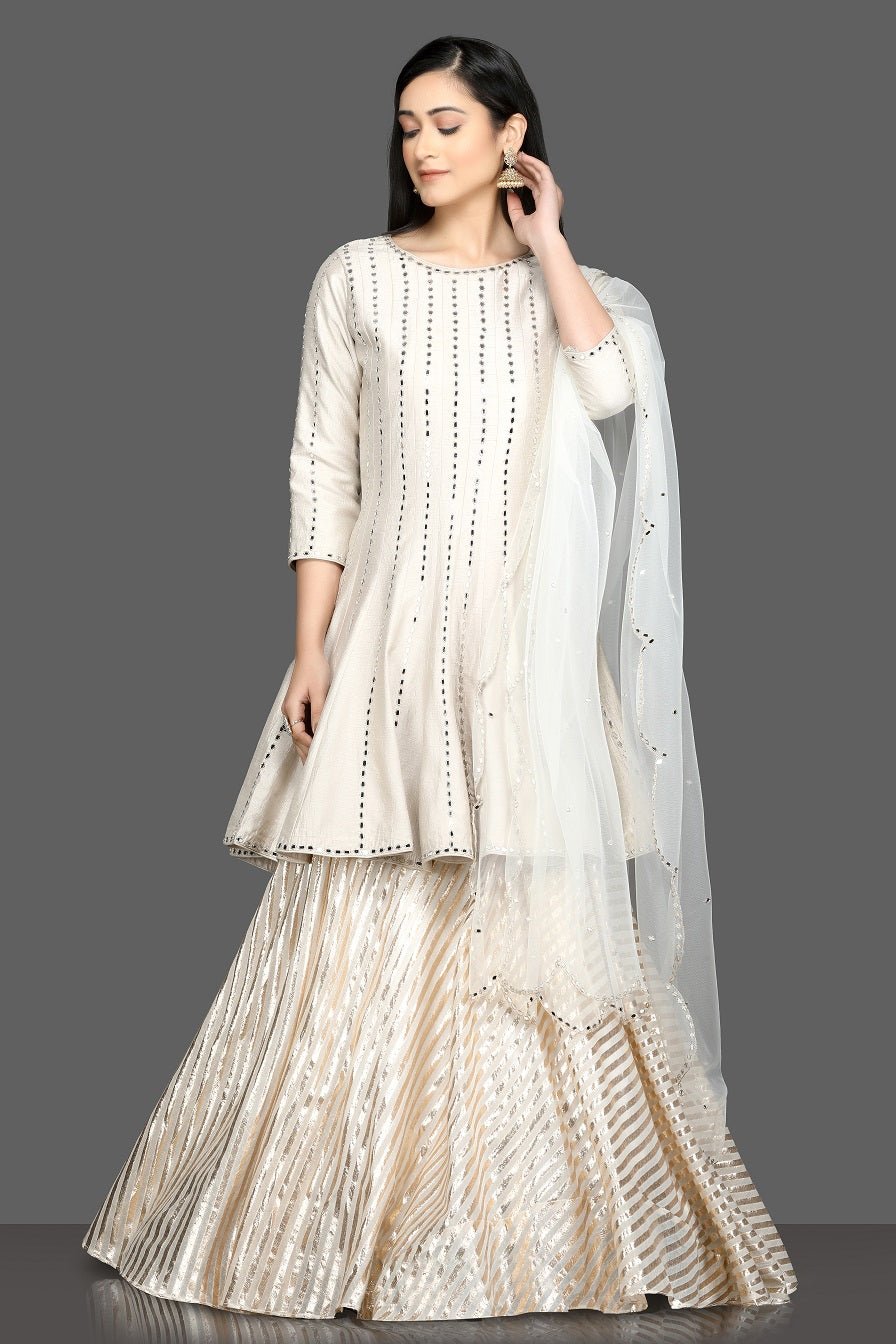Shop beautiful white mirror work peplum lehenga online in USA with net dupatta. Dazzle on weddings and special occasions with exquisite Indian designer dresses, sharara suits, Anarkali suits, bridal lehegas from Pure Elegance Indian fashion store in USA.-full view