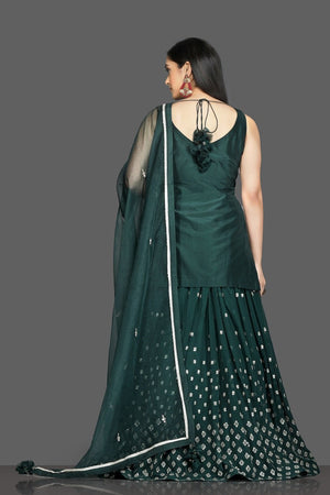 Buy stunning dark green embroidered lehenga online in USA with matching dupatta. Dazzle on weddings and special occasions with exquisite Indian designer dresses, sharara suits, Anarkali suits, wedding lehengas from Pure Elegance Indian fashion store in USA.-back