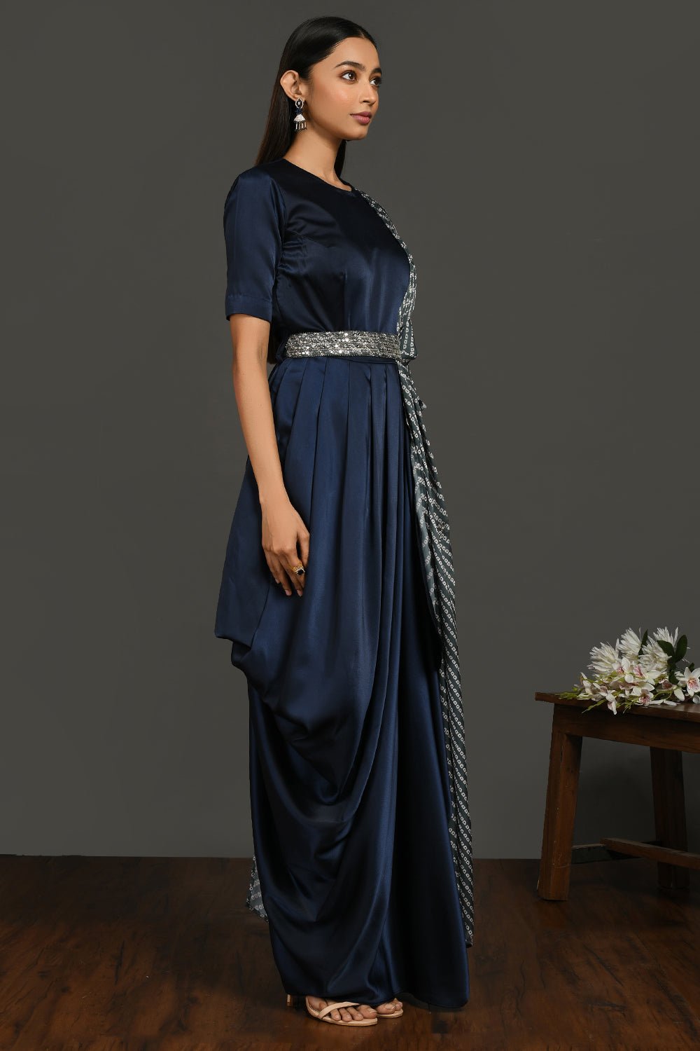 Shop gorgeous navy blue satin suit online in USA with grey dupatta and belt. Dazzle on weddings and special occasions with exquisite Indian designer dresses, sharara suits, Anarkali suits, wedding lehengas from Pure Elegance Indian fashion store in USA.-right
