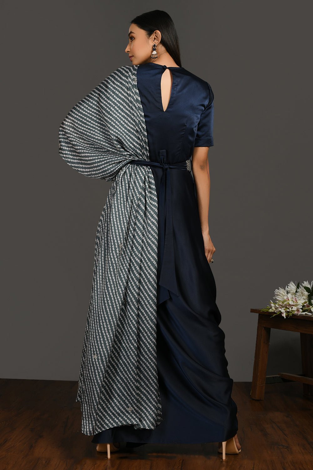 Shop gorgeous navy blue satin suit online in USA with grey dupatta and belt. Dazzle on weddings and special occasions with exquisite Indian designer dresses, sharara suits, Anarkali suits, wedding lehengas from Pure Elegance Indian fashion store in USA.-back