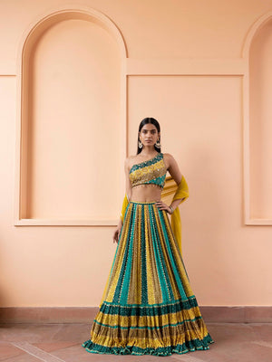 Shop beautiful green and mustard sripes bandhej one shoulder lehenga online in USA with dupatta. Dazzle on weddings and special occasions with exquisite Indian designer dresses, sharara suits, Anarkali suits, wedding lehengas from Pure Elegance Indian fashion store in USA.-full view
